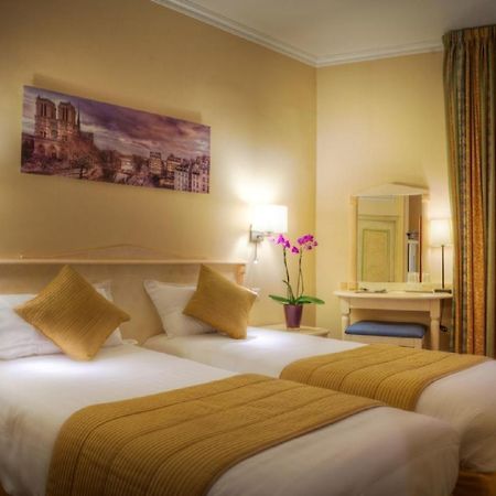 Hotel Louvre Sainte Anne Paris Phòng bức ảnh